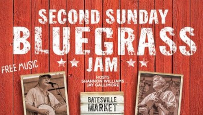 Second Sunday Bluegrass Jam poster on red barnwood at The Batesville Market