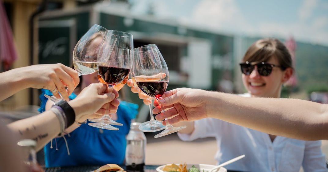 Friends toasting with wine glasses at Jefferson Vineyards